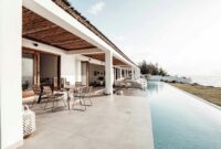 Beach Villas Luxury Beachfront Stays For Dream Vacations Contemporary villa with an infinity pool overlooking the ocean, perfect for luxury getaways.