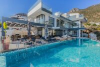 Royal Villas Exclusive Luxury Villas For Private Vacations Stunning contemporary villa featuring a spacious infinity pool and breathtaking mountain backdrop.